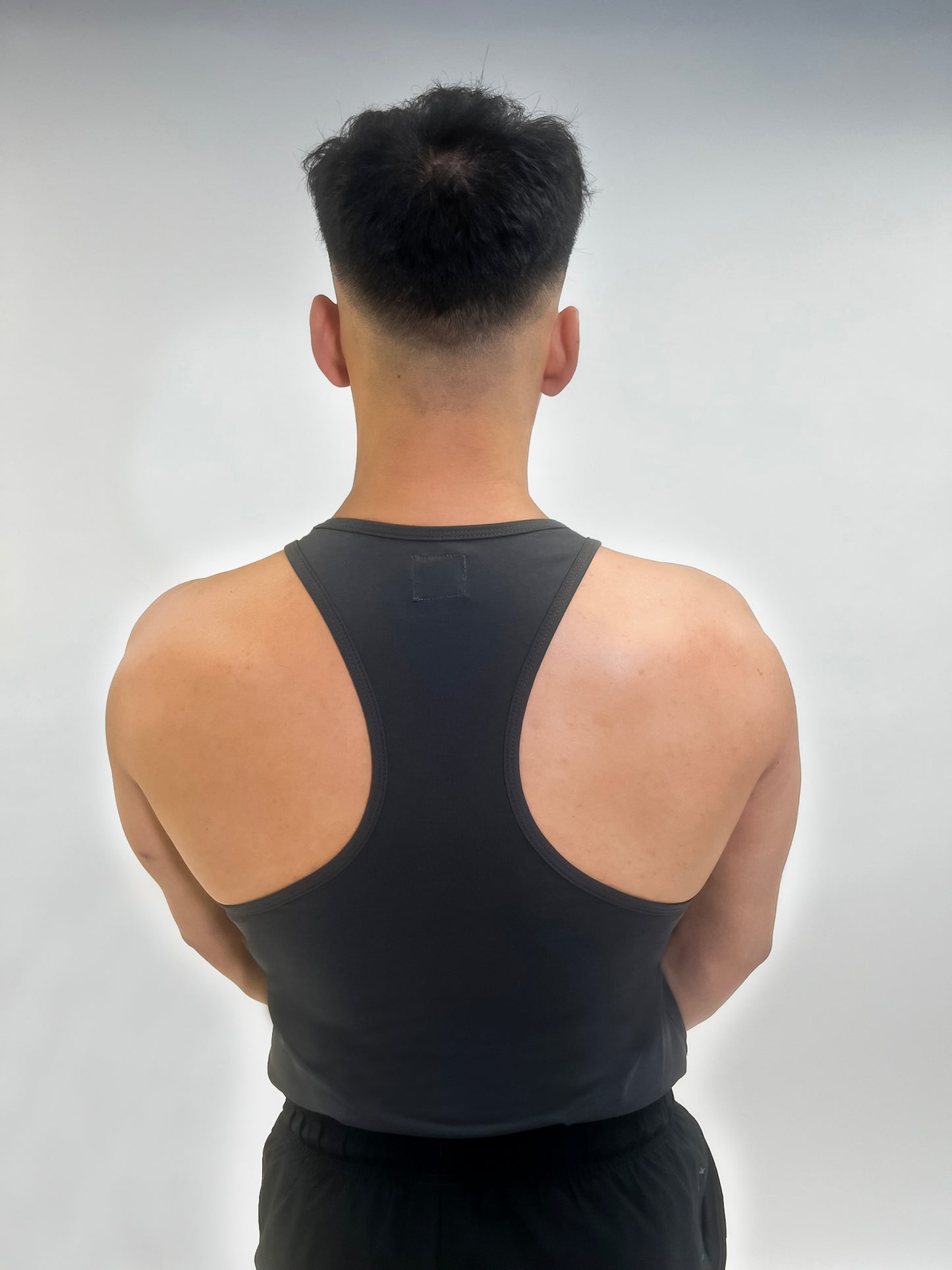 Back view of the Invicta Relentless Premium Fitted Gym Vest in grey.